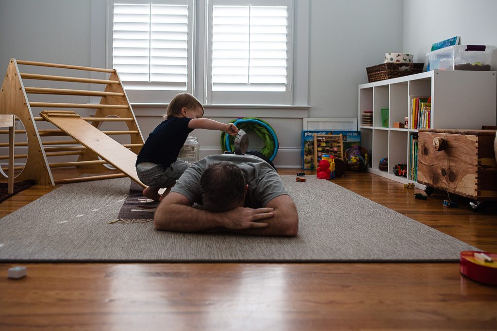 little boy playing with his dad
