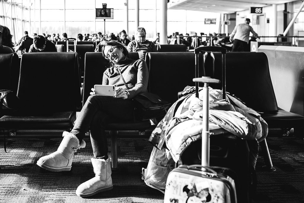 woman waiting for a plane to take off