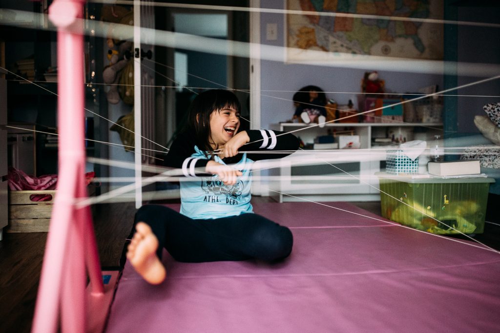 girl playing on a mat
