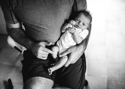 newborn baby with her dad