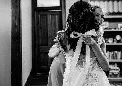bride and her best friend crying