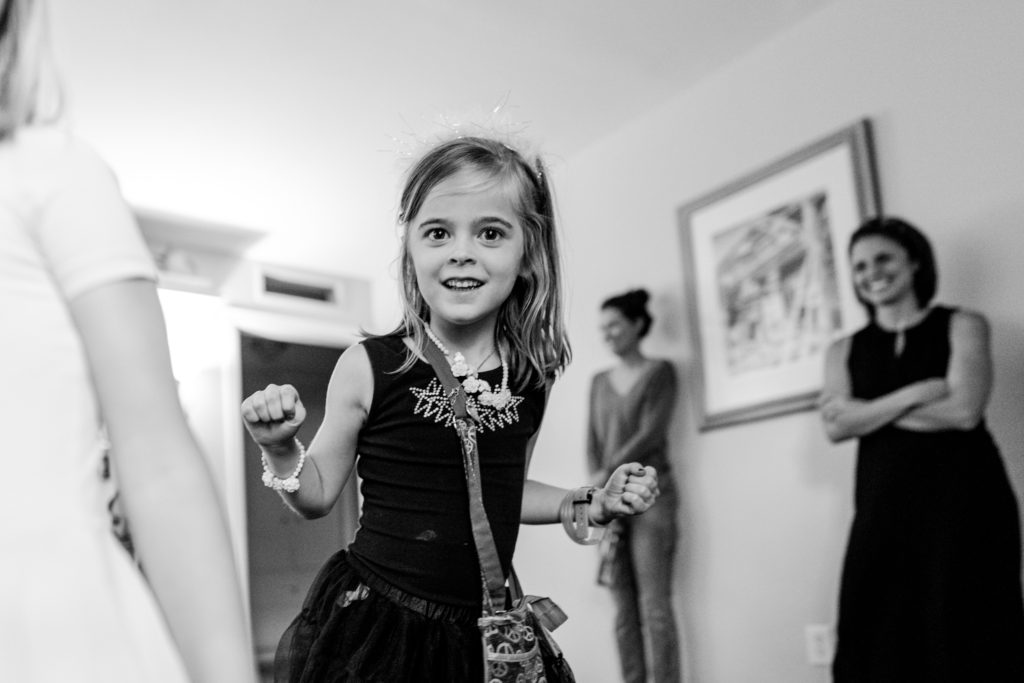 little girl dancing in the living room